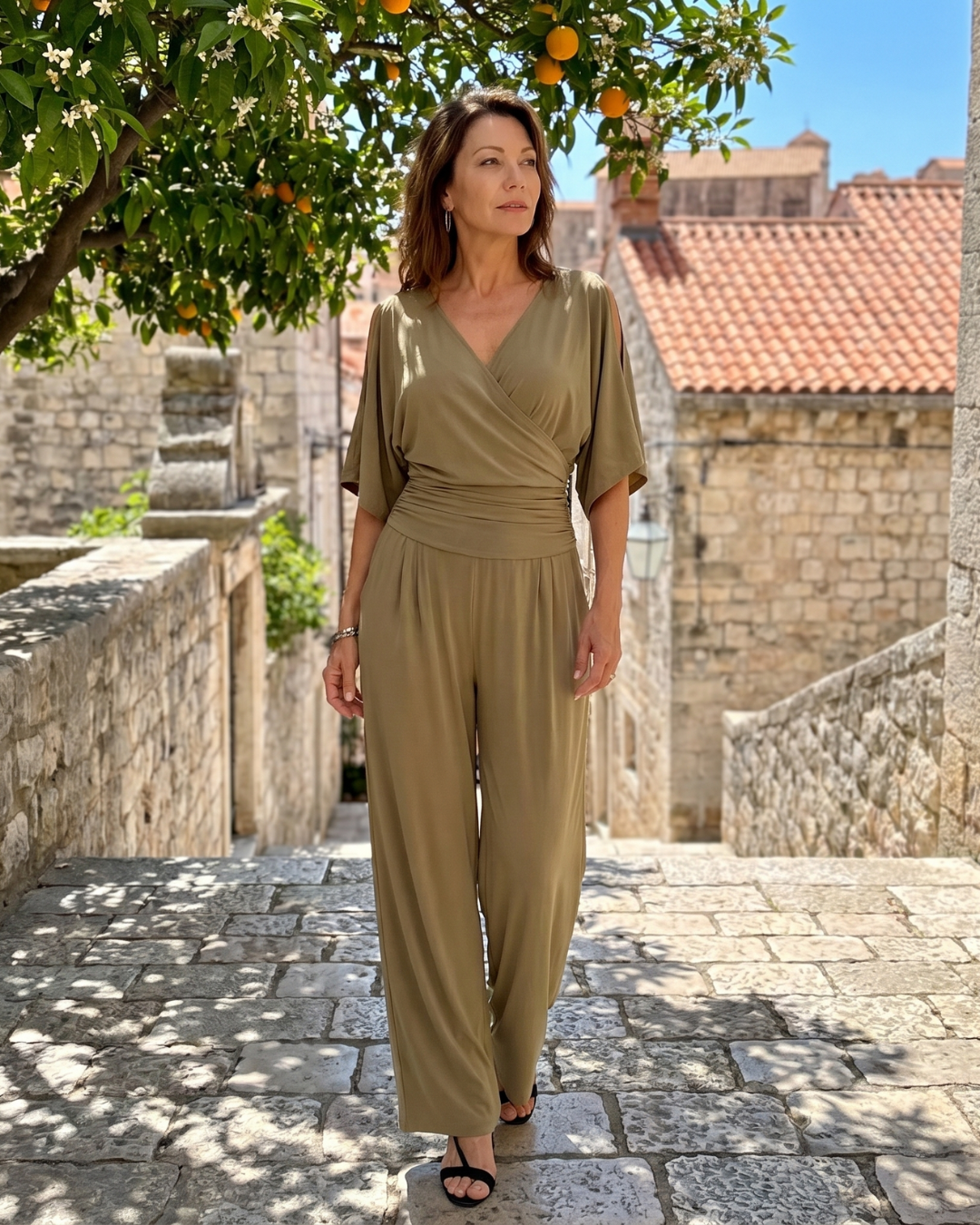 Nyxara | Relaxed Jumpsuit with Cold Shoulder and Wrap Waist